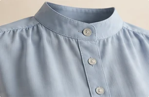 Band collar with long placket on a light blue shirt